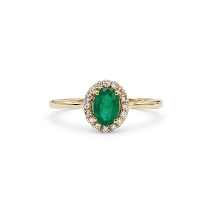 Oval-Shaped Green Emerald with Halo of Round Diamonds Ring in 14kt Yellow Gold