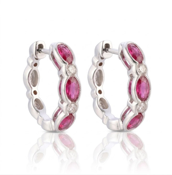 Le Vian® 14K Vanilla Gold® Passion Ruby® & Vanilla Diamond® Hoop Earrings These stunning Le Vian® hoops showcase 1 1/2 cts. of Passion Ruby® in a beautiful alternating pattern of oval and marquise shapes, radiating rich, vibrant pink-red color