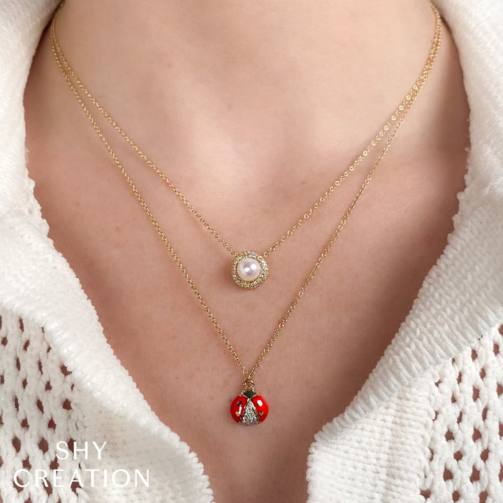 DIAMOND AND CULUTURED PEARL NECKLACE IN 14K YELLOW GOLD
