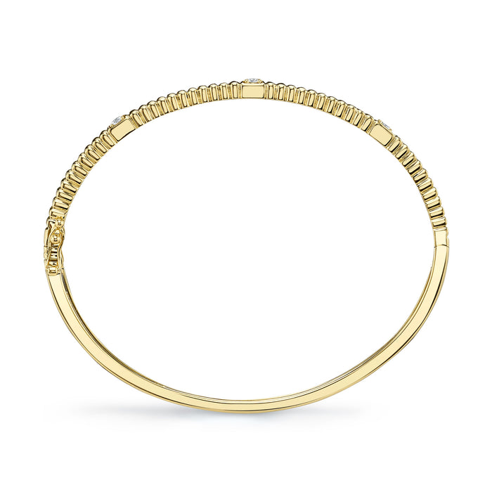 0.16CT DIAMOND BANGLE IN 14K YELLOW GOLD