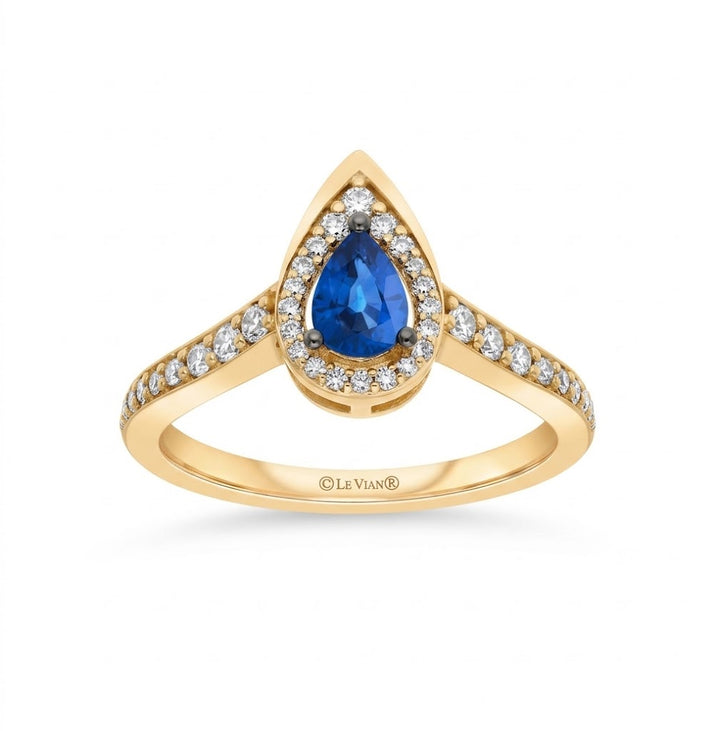 .41 TOTAL CARAT WEIGHT PEAR SHAPED BLUE SAPPHIRE AND .28 TOTAL CARAT WEIGHT ROUND DIAMOND HALO RING IN 14K YELLOW GOLD