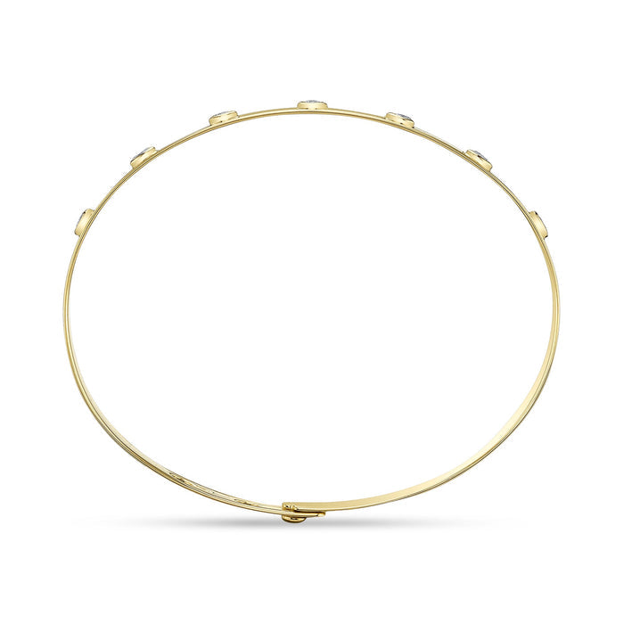 0.32 TOTAL CARAT WEIGHT DIAMOND BEZEL LATCH LOCK BANGLE IN 14K YELLOW GOLD