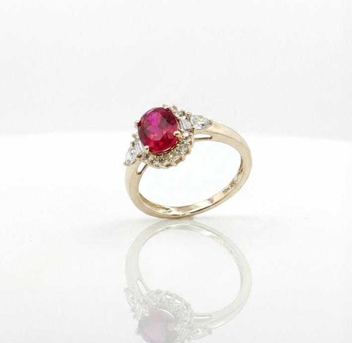 Oval Ruby & Lab-Grown Diamond Halo Ring | 1.65 ct Ruby | 0.40 ctw Diamonds | 10K Yellow Gold - Brownee Jewelers