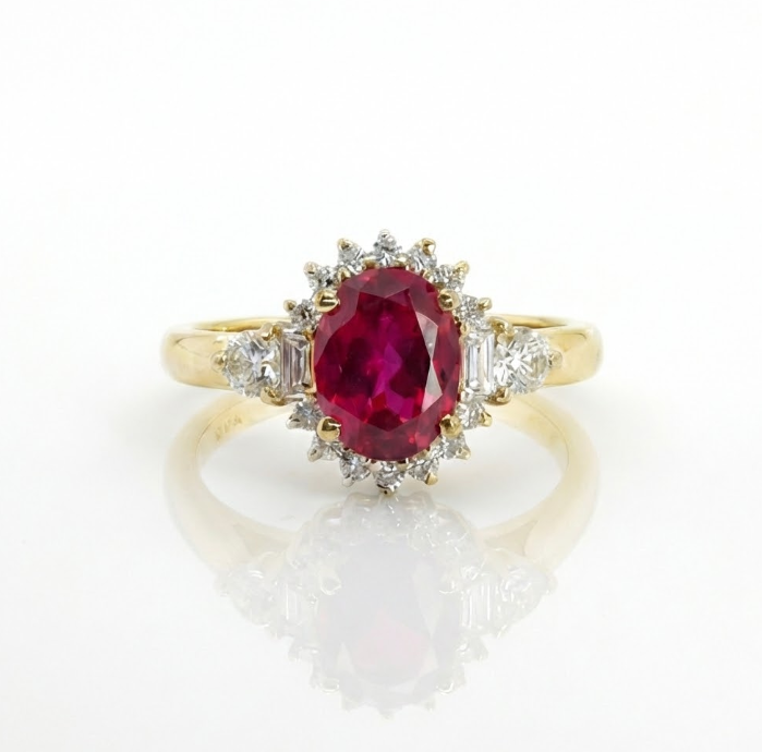 Oval Ruby & Lab-Grown Diamond Halo Ring | 1.65 ct Ruby | 0.40 ctw Diamonds | 10K Yellow Gold - Brownee Jewelers
