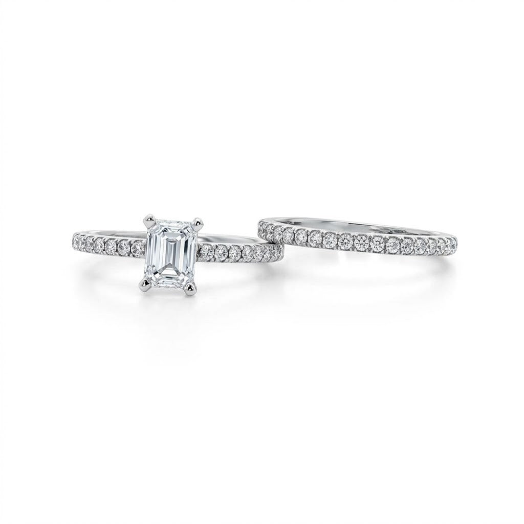 14 Karat White Gold Bridal Ring Set; Engagement Ring with a Center Emerald-Cut Lab-Grown Diamond with Round Lab-Grown Diamond Accents and Wedding Band with 21 Round Lab-Grown Diamonds
